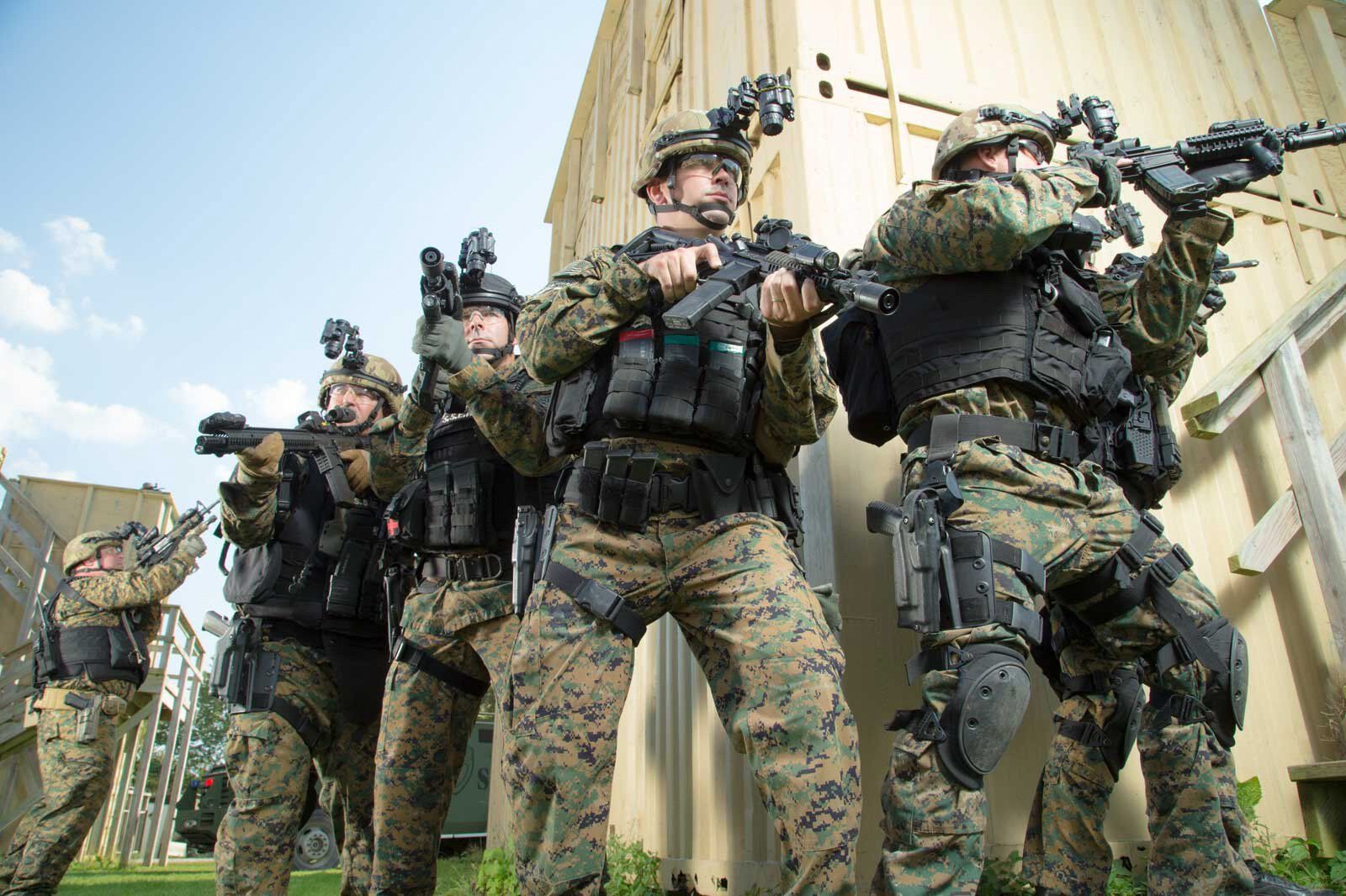 A group of tactical forces before photo retouching