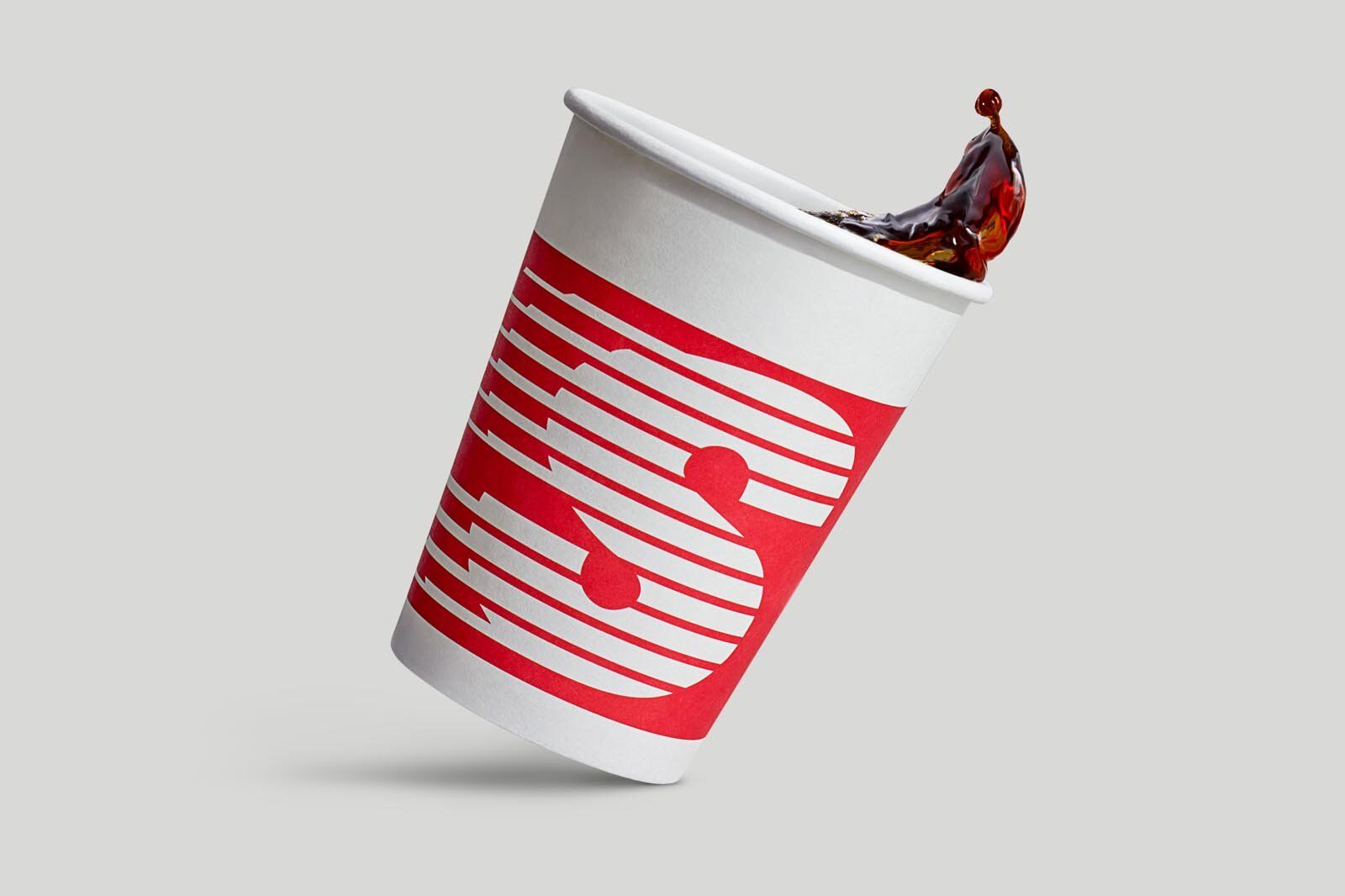 A coffee cup splashing speedway after retouching
