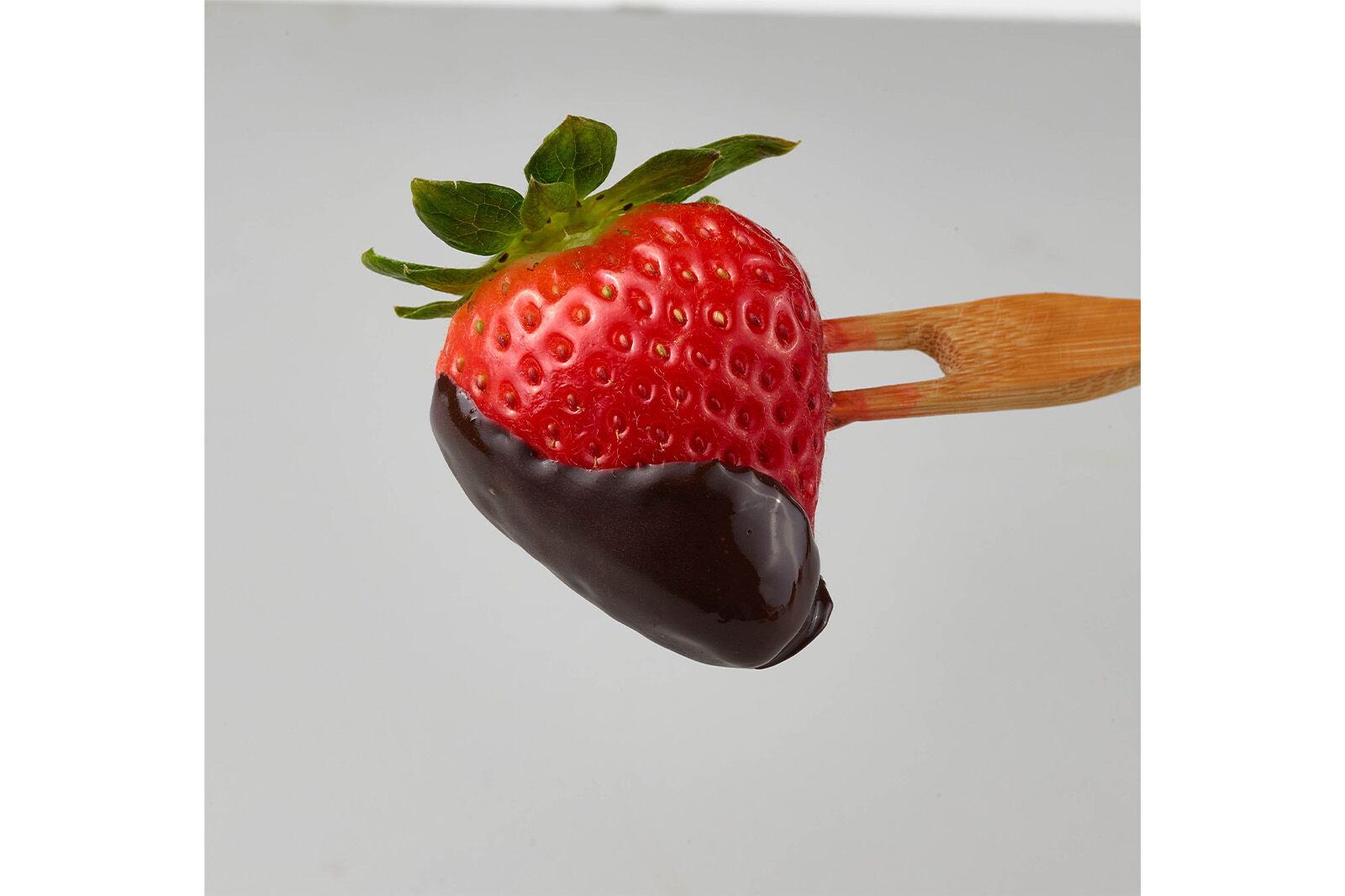 Before retouching food photography chocolate strawberry